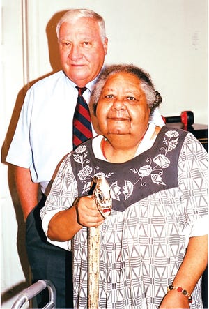 Savannah attorney Sonny Seiler stands with Valerie Fennel Aiken Boles in this photograph dated 2002. Boles was better known as the voodoo priestess "Minerva" in the book "Midnight in the Garden of Good and Evil."