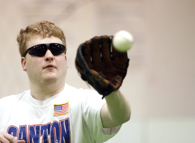 Drew Kanters warms up during pregame of the Challenger Baseball League at the Sportzone in Alliance