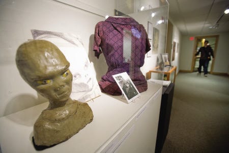 A papier-mache bust of an alien made by Marjorie Fish based on the description from Betty Hill of her abductors is on display at the UNH museum at Diamond Library in Durham.