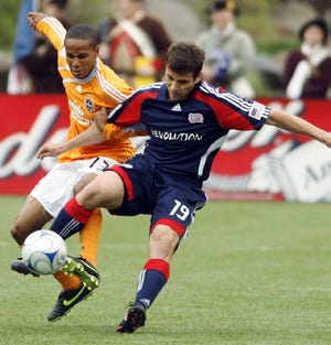 Milford's Michael Videira (right) recently made his MLS debut with the Revolution and has now played in two games.