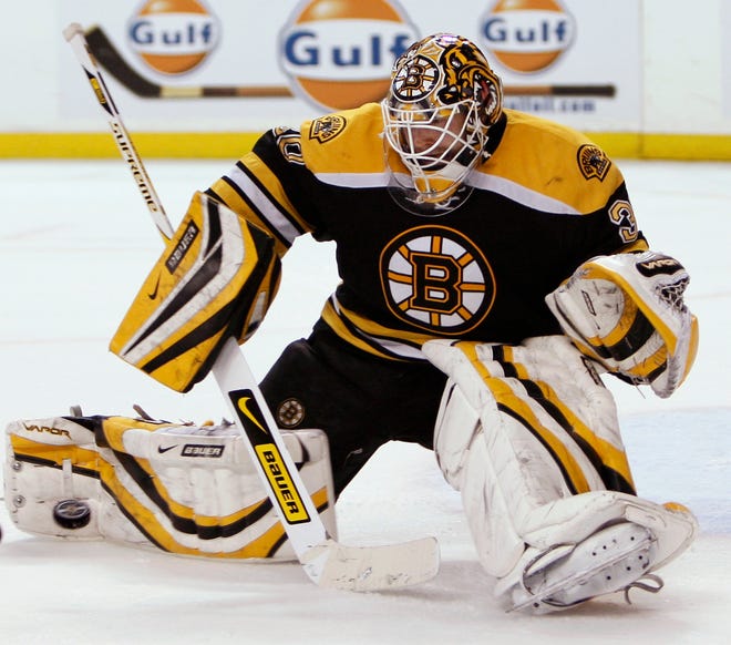Tim Thomas makes a save during the third period of the Bruins' 4-0 victory on Sunday night at the Garden.