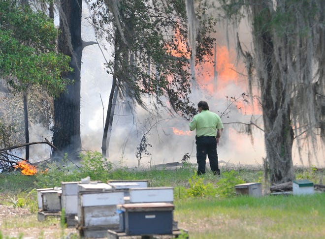 Winter Haven firefighters responded to an old abandoned, two-story house Tuesday that was on fire, along with a 40-by-60-foot grove barn. Firefighters received a call to the wood-frame house at 9:47 a.m. No one was at the home, which is a quarter-mile north of the Carefree Cove subdivision. The house fire, at an unknown address, is being ruled as suspicious and the incident is still be investigated, according to Lt. Jeff Hancock.