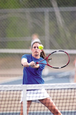 Winnacunnet’s Abby Pender warms up prior to her singles match on Friday.


Ken Stejbach photo