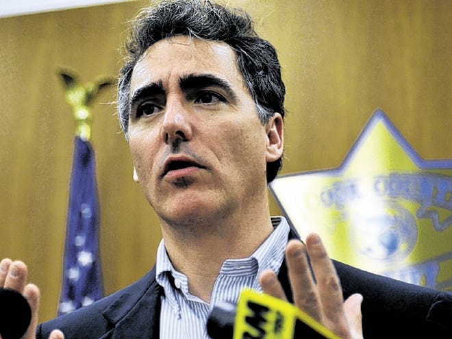 Cook County Sheriff Tom Dart talks to reporters during a news conference at his Chicago office, Wednesday, May 13, 2009. Online classifieds site Craigslist said Wednesday it will drop its controversial "erotic services" category in response to law enforcement leaders who said the ads were a front for prostitution.