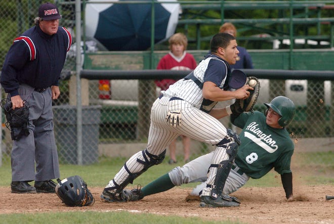 Abington’s Ian Campbell comes home as East Bridgewater catcher Nick Harmer fields the throw. The Green Wave score was part of a four-run fifth inning.