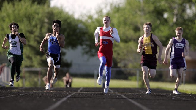 Oregon High School's Jordan Thomas (center) runs in the semifinal of the 200-meter dash Thursday, May 14, 2009, during the Big Northern Conference championships at Stillman Valley High School in Stillman Valley.
