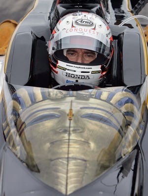 Canadian Alexandre Tagliani sits in his car Saturday during practice on the third day of qualifications for the Indianapolis 500 at the Indianapolis Motor Speedway in Indiana.