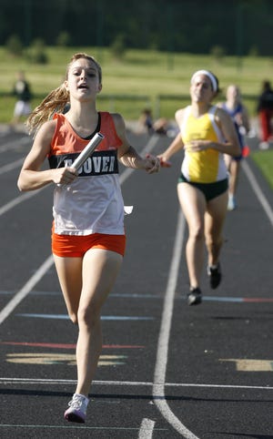 Allison Peare anchors the 4x800 meter relay for Hoover as they set a record for the event.