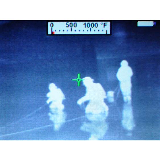 A screen on a thermal imaging camera shows three Portsmouth Firefighters using a lifeline to search for a firefighter during a training exercise in the dark and vacant Parade Mall building on Tuesday, May 19. [View  more photos ]