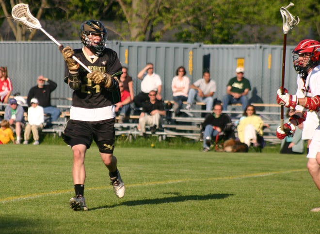 Chris Aycock (left) scored four goals for Rush-Henrietta in the Royal Comets game at Penfield.
