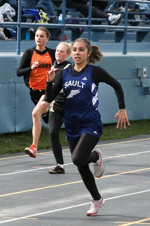 Sault High's Whitney Fitzgerald won the 100-meter dash, the 400 dash and anchored the winning 800 relay team.
