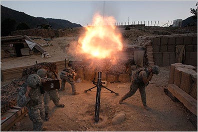 United States Army soldiers firing mortar shells last week at Taliban positions from a base in Afghanistan’s Kunar Province.