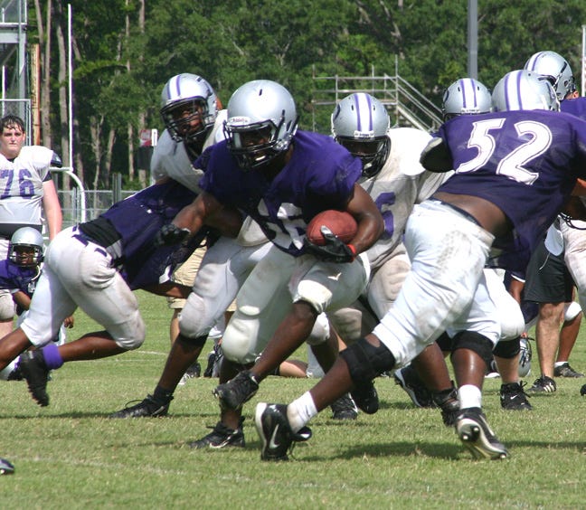 Dutchtown running back Effrem Reed cuts up field during an intrasquad scrimmage Saturday morning. Reed is the Griffins’ returning rushing leader.