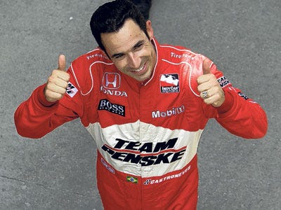 Pole-sitter Helio Castroneves, of Brazil, gives thumbs up after his final practice for the Indianapolis 500 auto race at the Indianapolis Motor Speedway in Indianapolis.