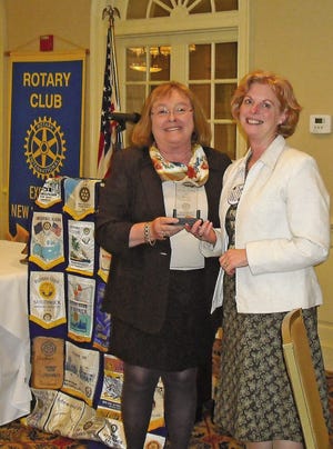 Exeter Rotary Club President Mae Bradshaw, left, presents the Exeter Rotarian of the Year Award to Marilyn Kellogg.
