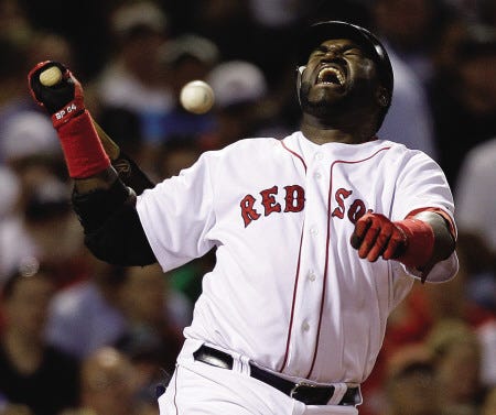 Boston Red Sox designated hitter David Ortiz yells after fouling a ball of his foot during the fifth inning of Boston’s game against Toronto at Fenway Park Thursday.