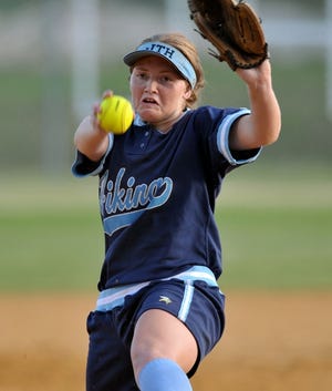 Hoggard pitcher Amanda White launches one toward home plate against Cape Fear in the second round of playoffs Friday night at Hoggard High School.