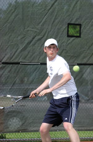 Apponequet's top singles player Pat Walker waits to return a shot during Friday's contest against Fairhaven. Walker finished the season with a perfect 18-0 record and never dropped a set.