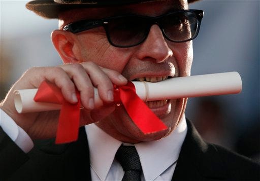 French director Jacques Audiard reacts after receiving the Grand Prix award for the film 'A Prophet' during the awards ceremony during the 62nd International film festival in Cannes, southern France.
