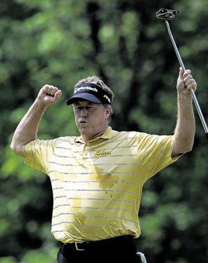 Michael Allen celebrates after winning the 70th Senior PGA Championship golf tournament at Canterbury Golf Club Sunday, May 24, 2009, in Beachwood, Ohio. Allen finished the tournament at six-under par.