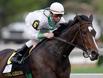 In this May 1, 2009 file photo, jockey Calvin Borel rides Rachel Alexandra on their way to winning the Kentucky Oaks horse race at Churchill Downs in Louisville, Ky.