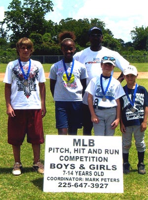 Hope Youth Development Inc. hosted a Major League Baseball Aquifina Pitch, Hit, and Run Sectional competition for the fifth consecutive year May 16 at Donaldsonville High School’s baseball field. Over 40 kids, along with their parents, varying from 10 parishes came out to show off their skills. Participants competed according to age groups and the top finisher will be eligible to compete in the Team Championship in Houston at Minute Maid Park. Mayor’s assistant Donna Gaignard threw the first pitch and the Ascension Tourism Commission donated gift bags for participants and bottled water for all. Winners are from left, 13-14 year-old Jarreth Seven, 11-12 year-old Skylar O’Bear, 9-10 year-old Joel Bergeron and 7-8 year-old Andrew Martin with director Mark Peters.