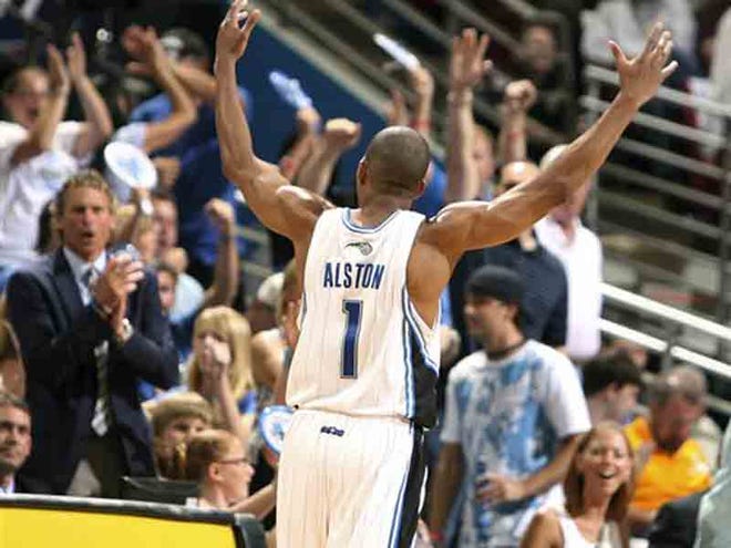 Orlando Magic guard Rafer Alston celebrates a 3-pointer in the third quarter of Game 4 against the Cleveland Cavaliers in the NBA basketball Eastern Conference finals Tuesday, May 26, 2009, in Orlando, Fla.
