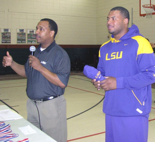 The closing ceremony in the middle school gym surprised the fourth graders when guest speakers LSU wide receivers coach, D. J. McCarthy and LSU running back Charles Scott walked through the doors.