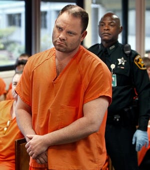 Richard Thomas stands before county judge Robert Williams during 1st appearance at the Polk County Jail Annex in Bartow , Florida on May 28, 2009.