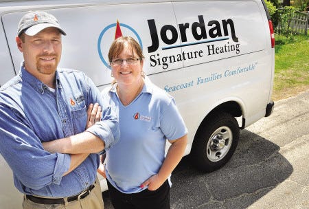 Bill and Anita Jordan of Jordan Signature Heating in Exeter say they called their mothers after hearing their company had been named Business of the Year by Business NH Magazine.