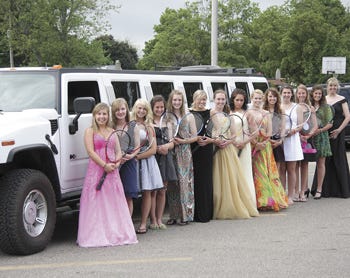 Members of the Sturgis tennis team that left for Michigan State University Thursday afternoon to compete at the State Tournament are, from left, Raychel Bell, Ellen Stimson, Taylor Abbs, Jen Blouin, Ella Inman, Morgan Bregitzer, Sammie Pahls, Emily Stimson, Meredith Donmyer, Martha Rehm, Stacie Cressman, Brooke Wohlers, Katie Johnson and coach Jessica Riley.