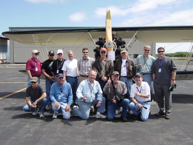 The participant in the reenactment. A procession of small planes flew from the Mansfield Municipal Airport to the George Harlow Airport in Marshfield to reenact and commemorate the Massachusetts leg of Charles Lindbergh’s historic transatlantic flight. Top, left to right: John Papp, Jim (last name unavailable), John Bennett, Dennis Oakman, Steve Oakman, Jim Horan, Dave Fetherston, Bill Midon and Dave Dinneen; kneeling, Ron Nation, John Brennan, Tom Corcoran Bud Francis and Ken Dye.