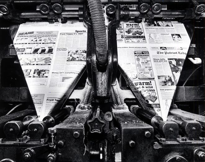 Jan 7 1987: Papers stream through the press to the folder. Here they are cut and folded. Completed papers emerge, ready for delivery.
