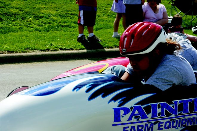 JUSTIN SIMS/DAILY REVIEW ATLAS
Shilah Bates races down the Sixth Street hill on Saturday morning during the Soap Box Derby. The event took place from 9 a.m. to 12 p.m.