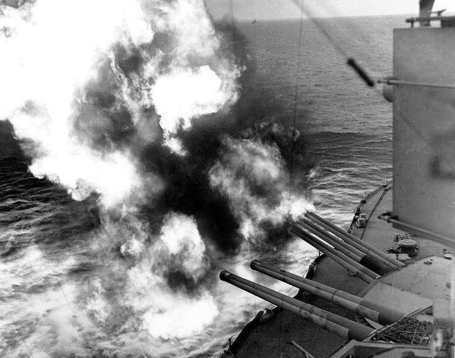 Forward 14"/45 guns of USS Nevada (BB-36) fire on positions ashore, during the landings on "Utah" Beach, 6 June 1944