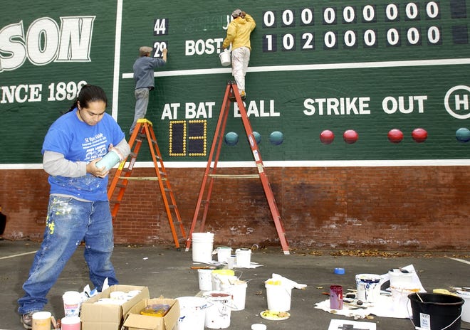 In this photo from October 2004, artists update the Fenway Park mural on the wall of the WB Mason building on Centre Street in downtown Brockton to reflect the scoreboard of the first Red Sox World Series championship in 86 years. WB Mason has an ad on the "Green Monster" at Fenway Park.


(J. KIELY JR./THE ENTERPRISE)