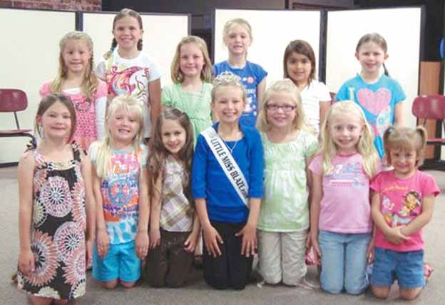 Twelve girls are vying for the title of 2009 Little Miss Blaze. The pageant will be held Friday kicking off the annual Annawan Fun Days weekend. Shown with 2008 Little Miss Blaze Maddy Brown, front row center, are, front row from the left, Keegan Rico, 6; Sophia Wiesbrook,6; Gwen VandeVoorde, 5; Kaley Peterson, 7; Courtney Baele, 6; and Sky DePauw, 5. Standing are Cali McKibbon, 5; Maggie Miller, 7; Emily Jagers, 6; Ella Manuel. 6; Sophia Roldan, 5; and Rylee Miller, 5.