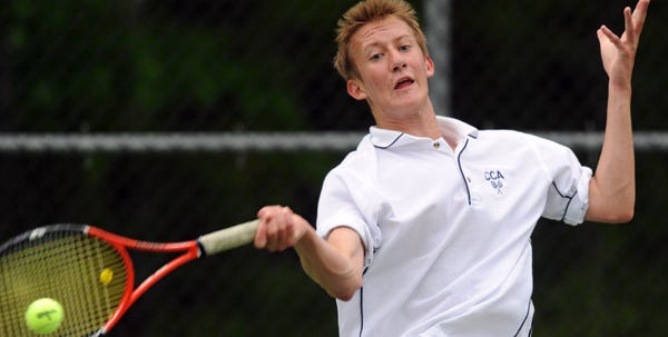 Cape Cod Academy’s Eric Eldredge hits a forehand at his Cohasset opponent during Wednesday's first doubles match. Cape Cod Academy defeated Cohasset, 5-0.