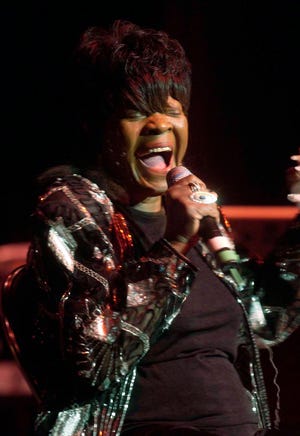 In this Jan. 16, 2005, file photo Koko Taylor sings at the Harold Washington Cultural Center in Chicago. Taylor, the Grammy-winning "Queen of the Blues," died Wednesday, June 3, 2009, after complications from surgery. She was 80.