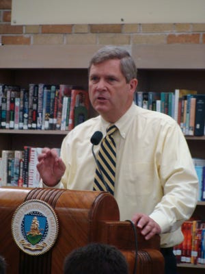 Tom Vilsack, the U.S. Secretary of Agriculture, speaks during a question and answer forum in the Geneseo High School library on June 1.