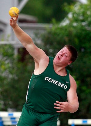 Curt Jensen heaves the shot put 56-1 3/4 to take third place in the state May 30 in Charleston.