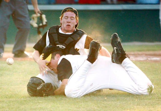Fulton catcher Brandon Hammerstone and pitcher Cameron Krull collide while chasing a popup during the Hornets’ 12-4 loss to Carl Junction in a MSHSAA Class 3 semifinal last night in Springfield.