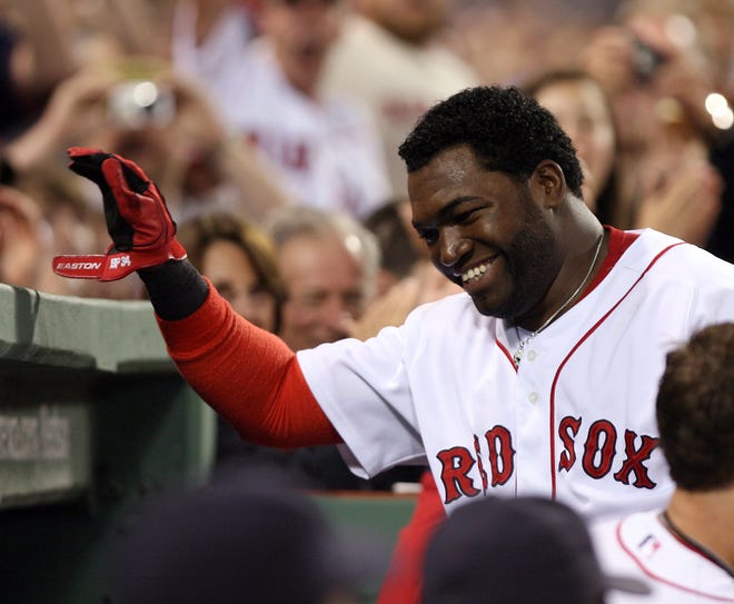 Boston's David Ortiz (34) smiles after hitting a home run.