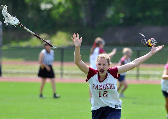 Westborough's Megan Sullivan celebrates after the Rangers beat Algonquin 14-6 to win the Division 1 Central championship.
