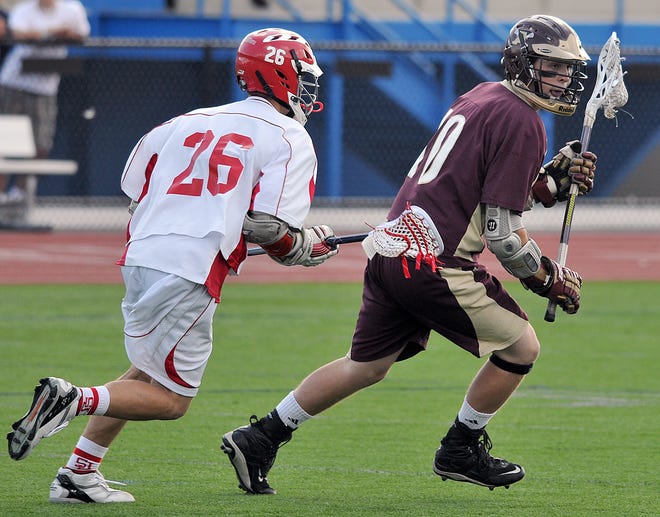 Algonquin's Brian Murphy controls the ball on Saturday against St. John's.