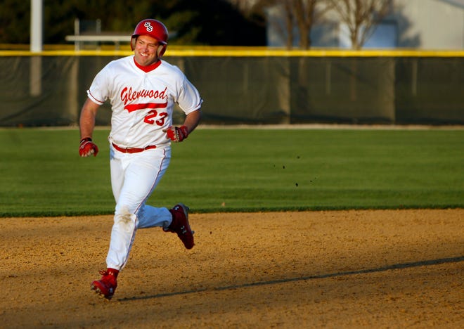 Glenwood's Tristan Molumby trots around the infield after his home run gave the Titans the win against the Lanphier Lions in extra innings Wednesday, April 8, 2009. Ted Schurter/The State Journal-Register.