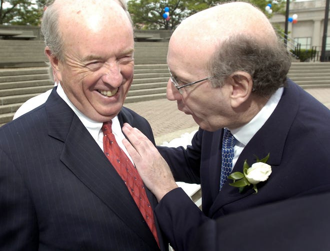 Brockton State Sen. Robert Creedon, left, shares a laugh with Kenneth Feinberg, the Brockton native who served the nation as special master of the 9-11 Fund following the terrorist attacks of Sept. 11, 2001.