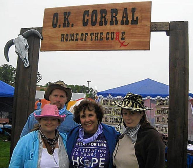 Connie Baldassare, second from right, ovarian cancer survivor of five years, is joined by supporters, from left, Jennifer Antola, Billy Kappes and Kim Ellingsgard, all from Bushkill, at the sixth annual Relay for Life event held at the East Stroudsburg High School-North campus last Friday and Saturday.