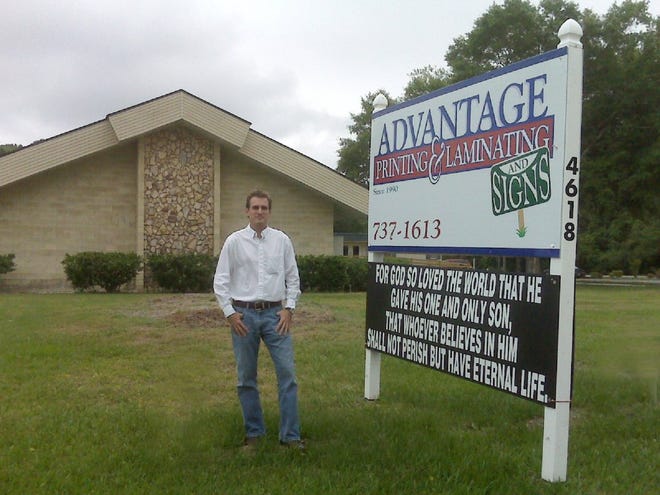 Provided by Troy McGeeTroy McGee stands in front of his business, Advantage Laminating and Printing of Florida Inc., located in the former Church of the High Praise on Sunbeam Road.