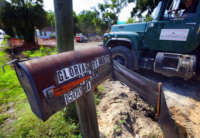 All that's left of Gloria's Beauty Salon is a tattered mailbox. Manes Trucking and Equipment is demolishing old businesses on the corner of Martin Luther King and Silver Springs Boulevard. Shown on Friday, the demolition will make way for a new small shopping center.